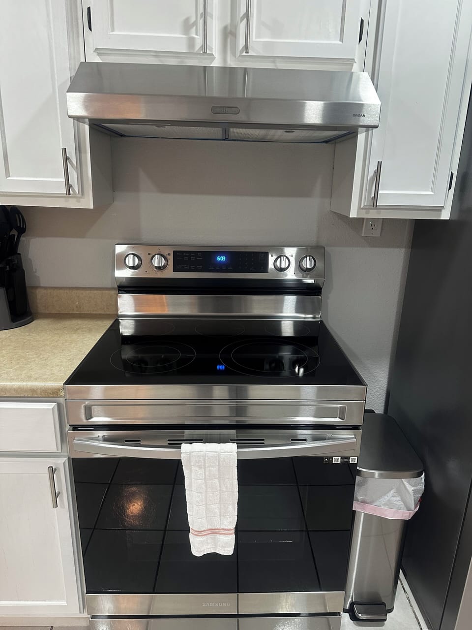 Kitchen has a new stove and oven to cook your favorite meal