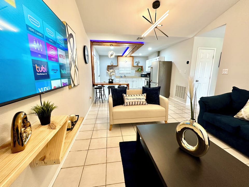 Open concept living room, kitchen and dinning table