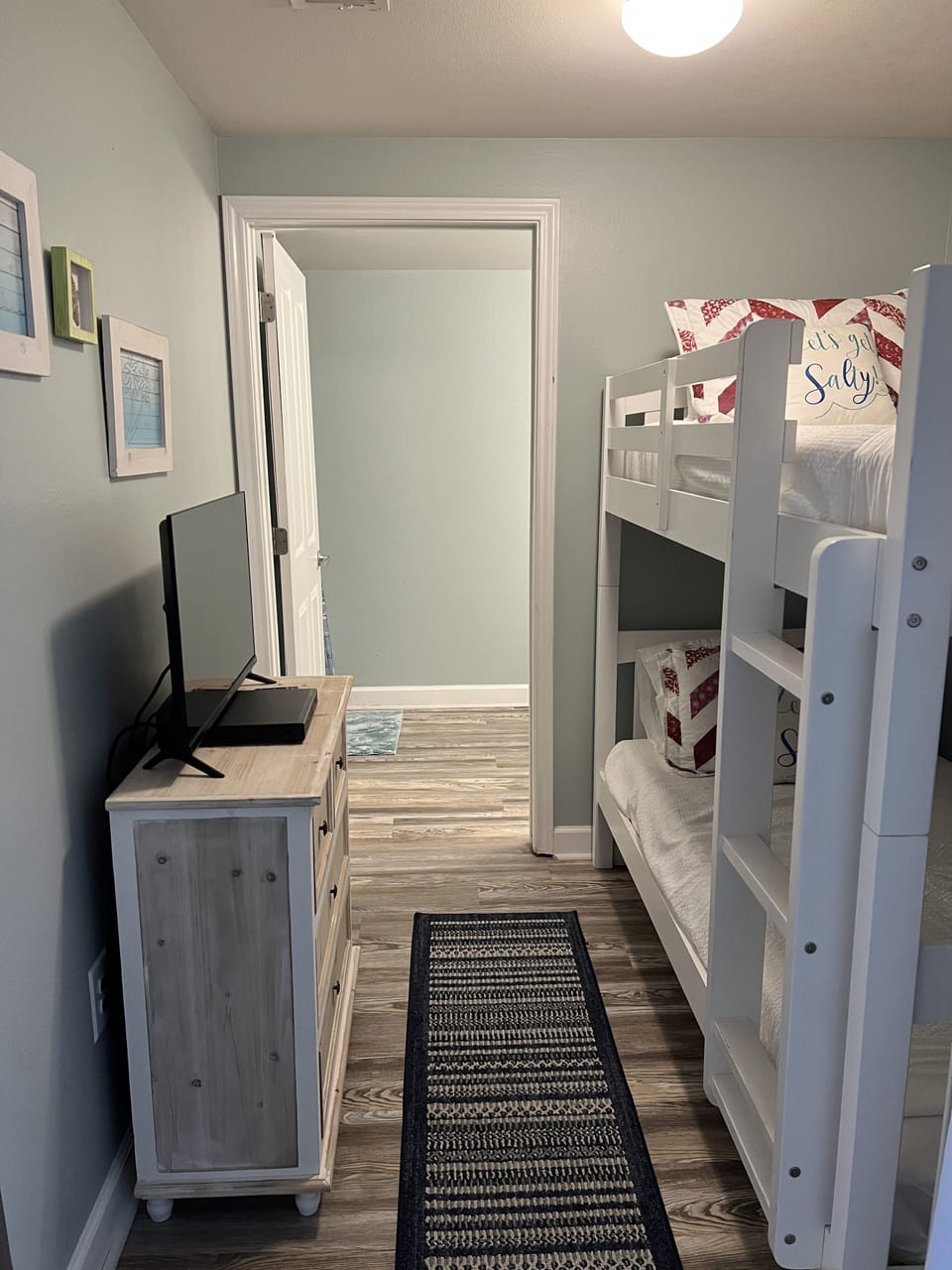 Bunk bed room with tv and full bath 