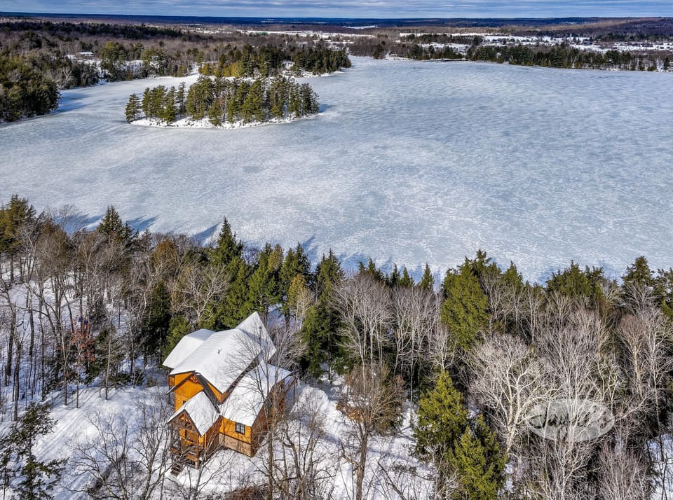 Aerial View of Cottage &amp; Turtle Lake