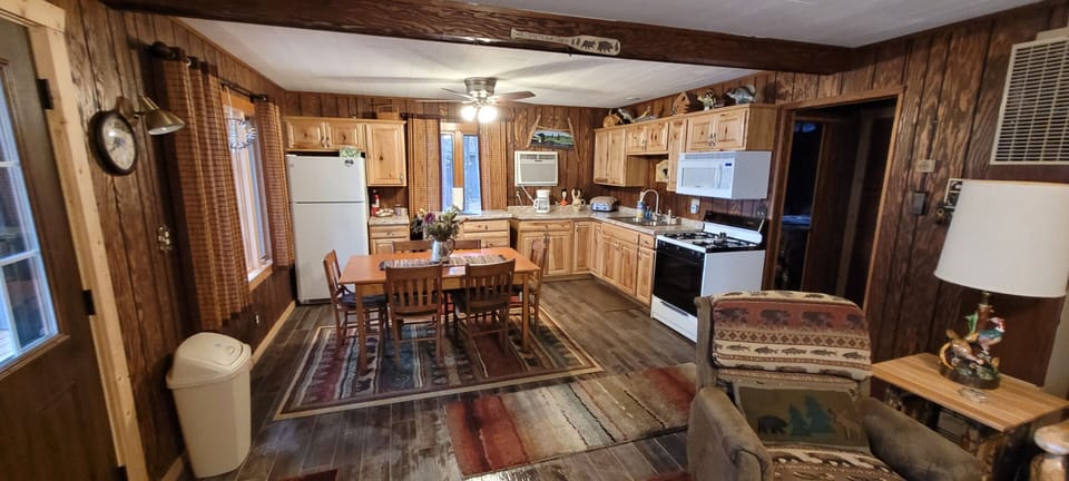 Kitchen with dining and games table. 
