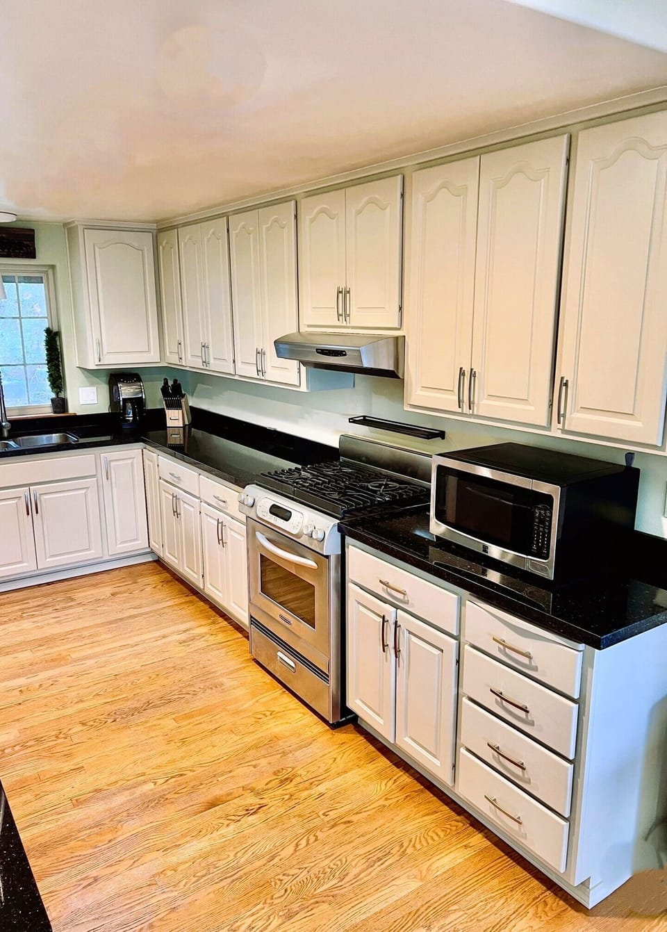 Remodeled kitchen with all stainless-steel appliances. 