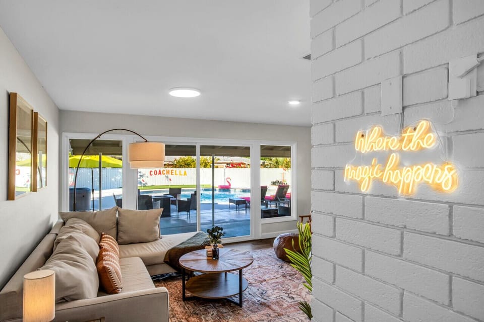 Living area w/ brand new 65` smart tv - Neon Signs