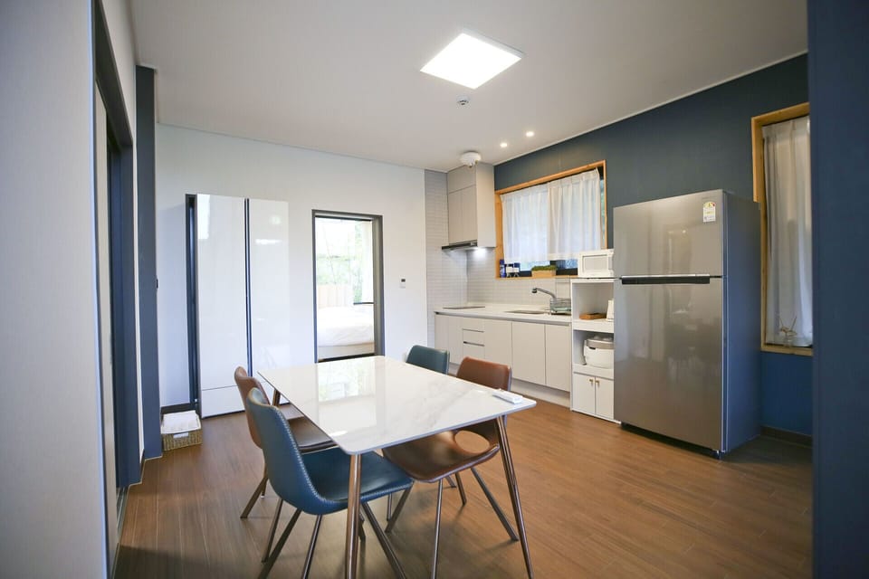 Elsa's House 2F | Living area | 60-inch flat-screen TV with cable channels, heated floors