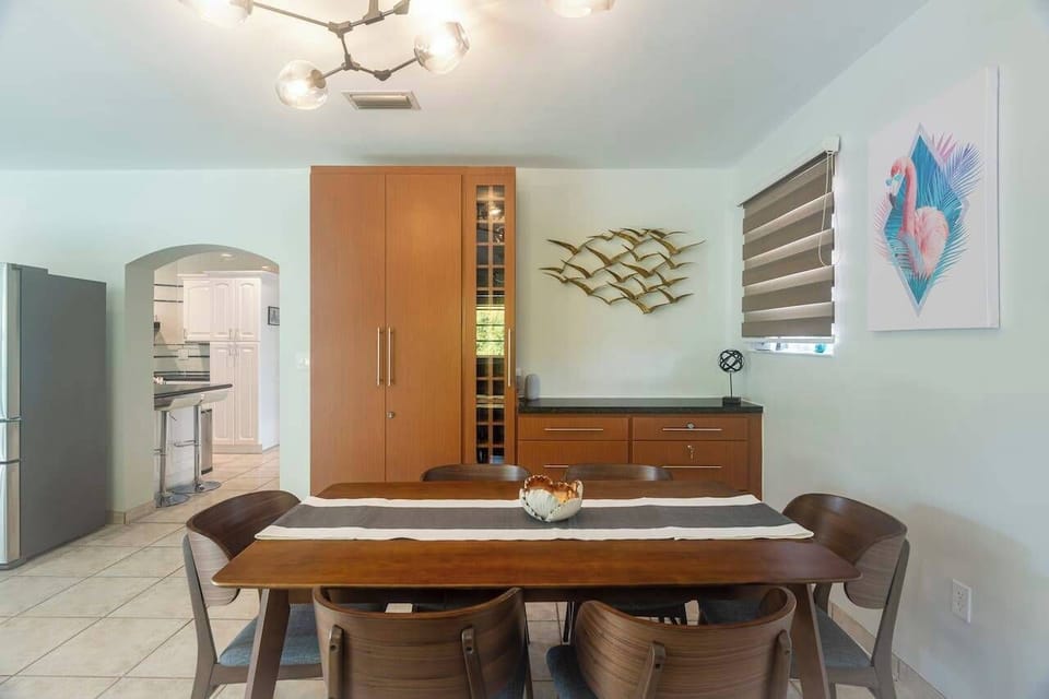 Roomy dining table that can comfortably accommodate a party of six.