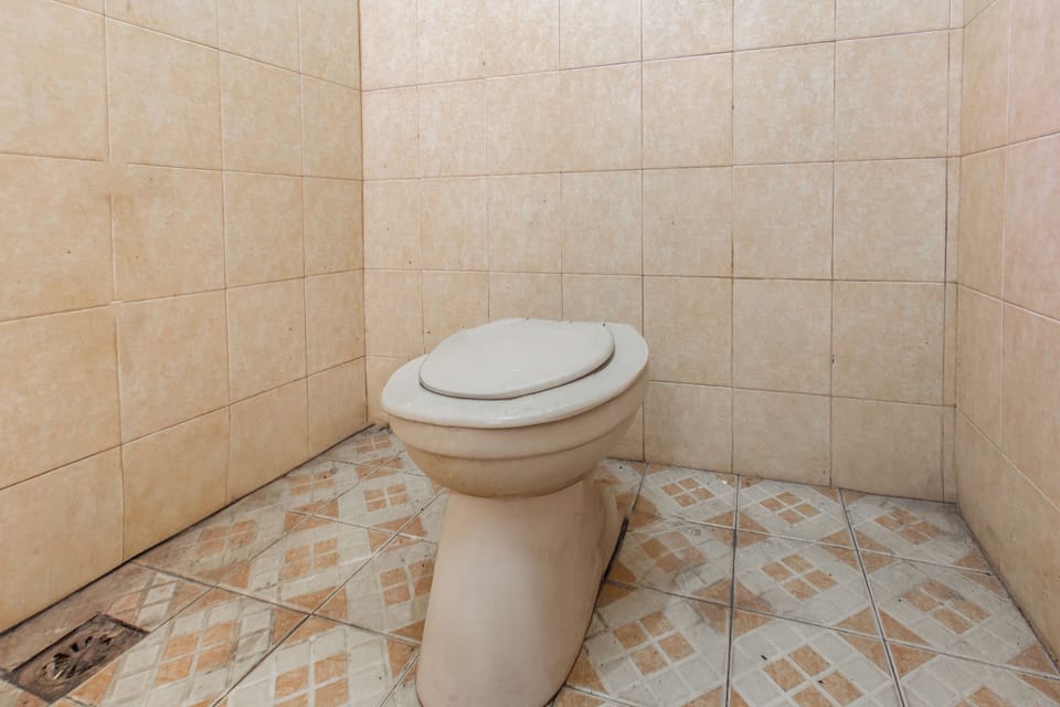 Economy Double Room | Bathroom | Shower, towels, soap