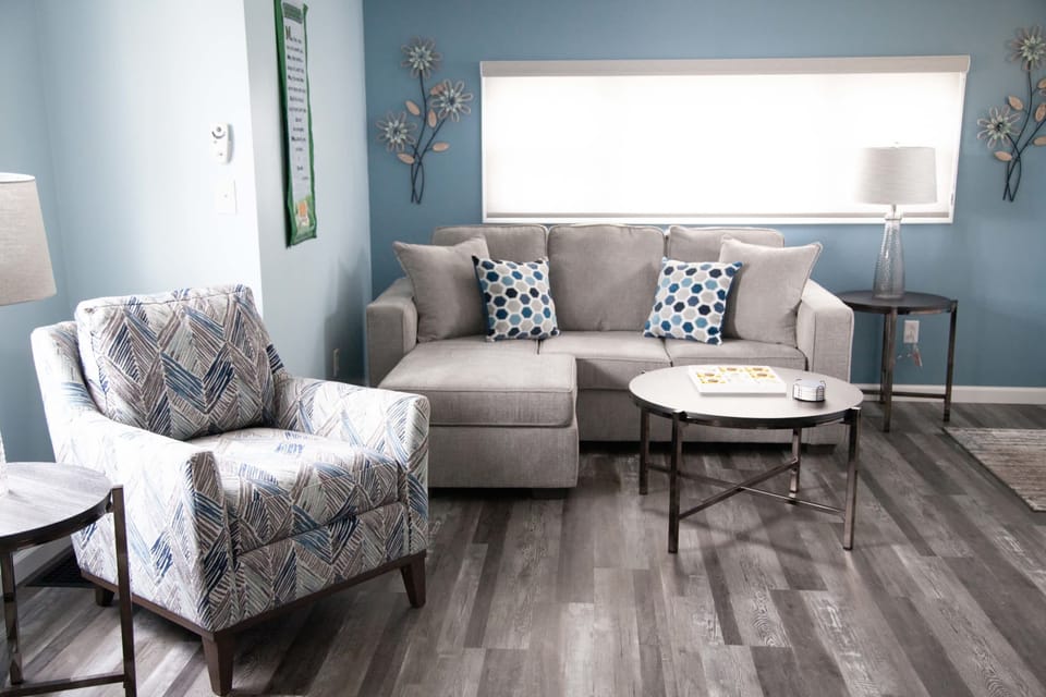 Living Room- Bright, inviting space to relax after a day of exploring