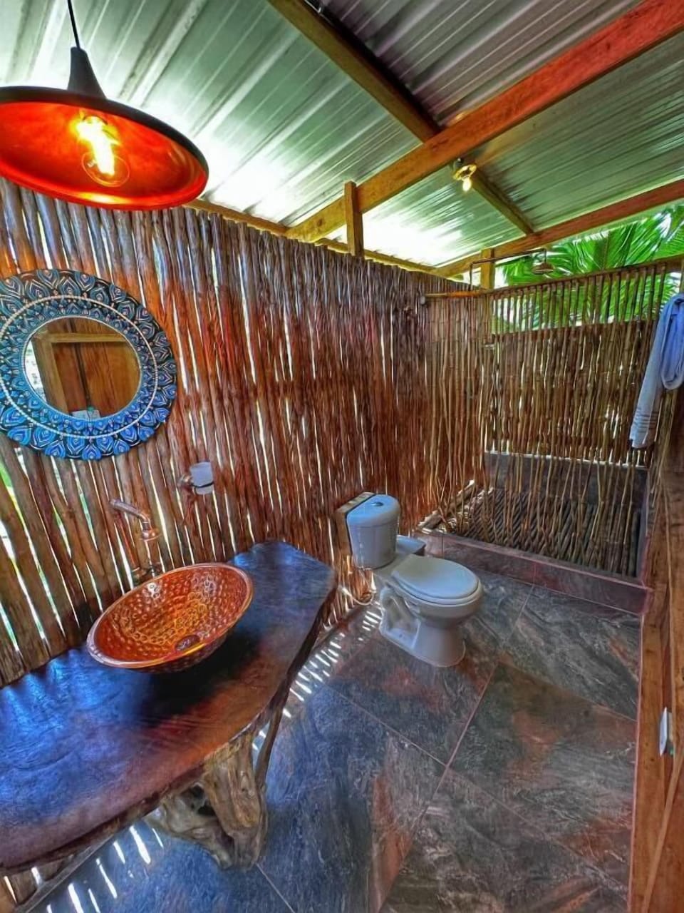 Deluxe Bungalow | Bathroom | Shower, towels, soap, toilet paper