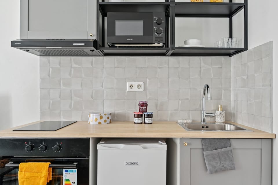 The kitchen is fully equipped to prepare a simple meal