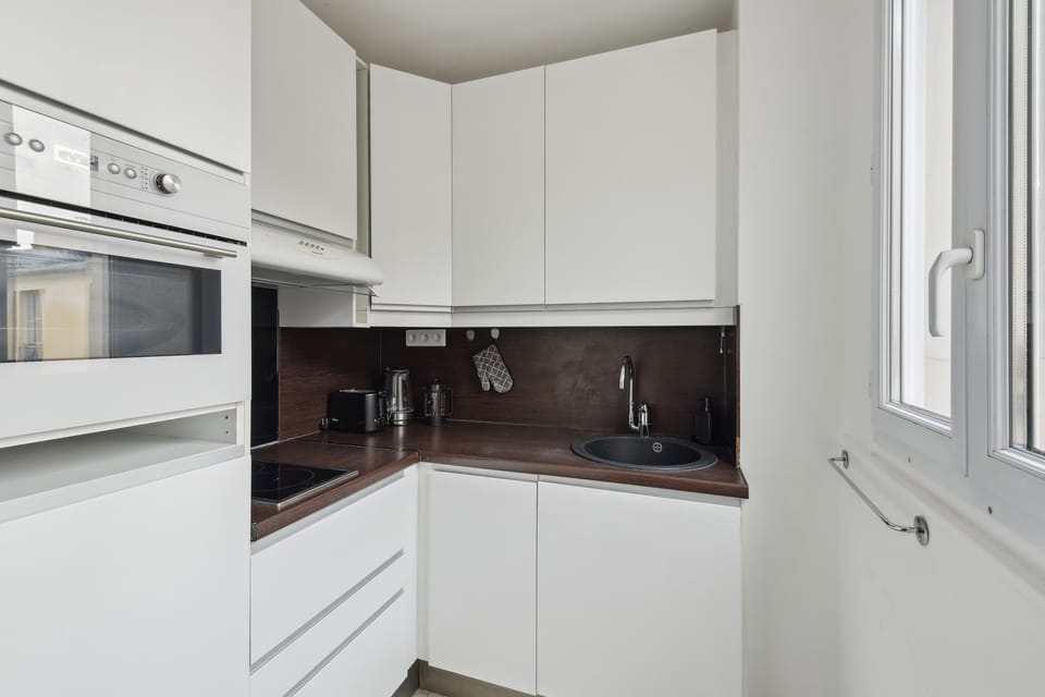The kitchen is fully equipped to prepare a simple meal