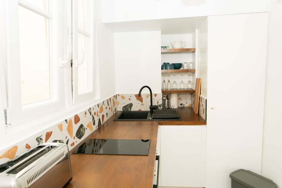 The kitchen is fully equipped to prepare a simple meal