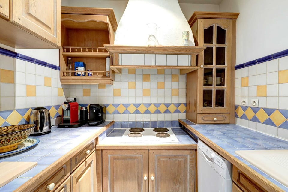 The kitchen is fully equipped to prepare a simple meal