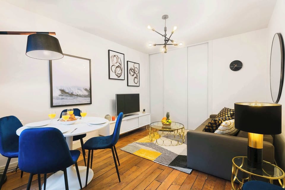 There is a dining table with chairs for 4 guests