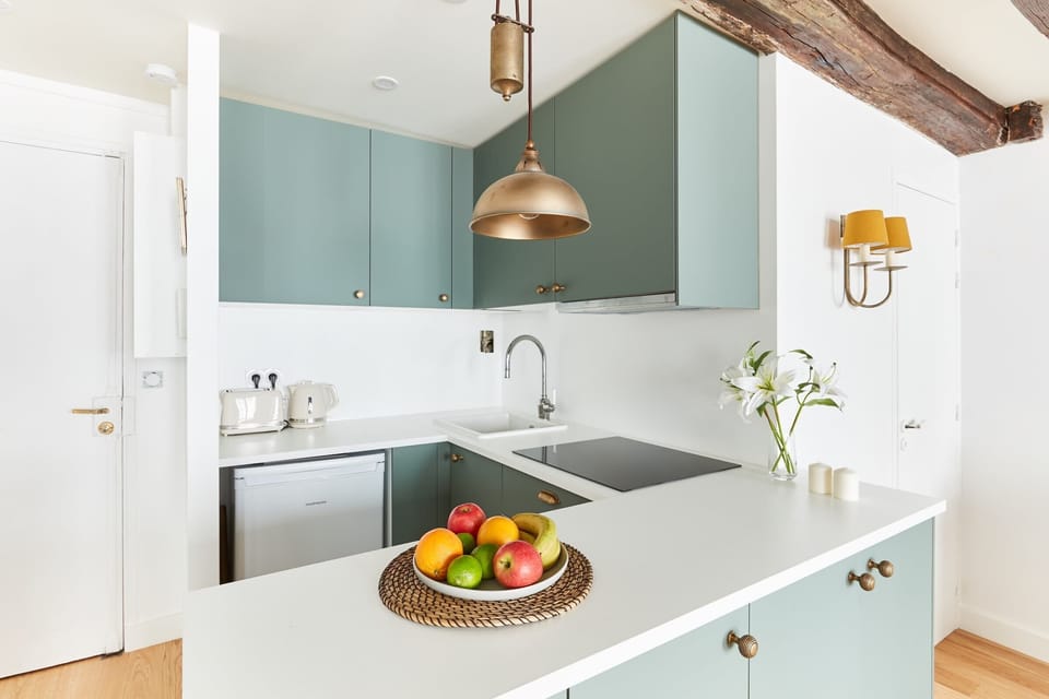 The kitchen is fully equipped to prepare a simple meal