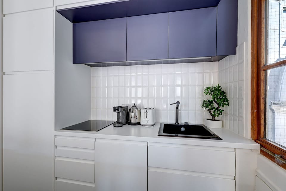 The kitchen is fully equipped to prepare a simple meal