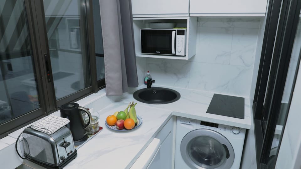 The kitchen is fully equipped to prepare a simple meal