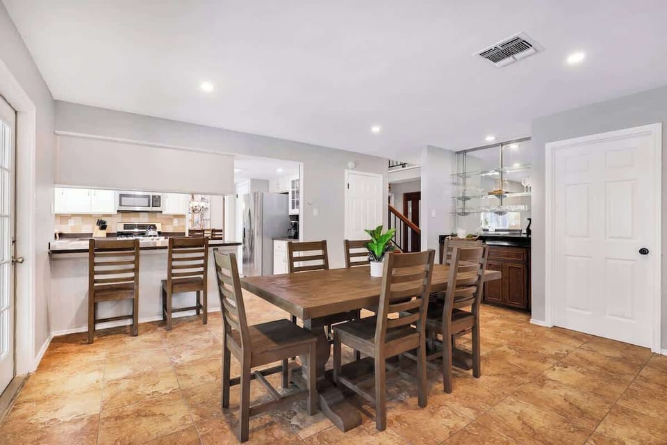 Dining area with bar nearby