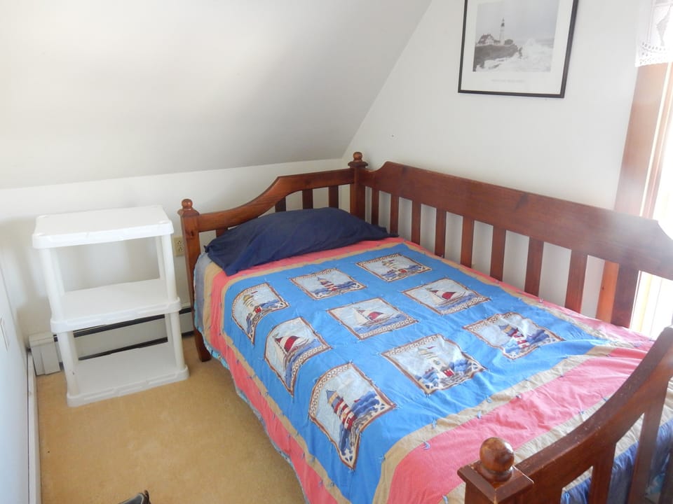 The second bedroom has a twin bed and workplace for your laptop.