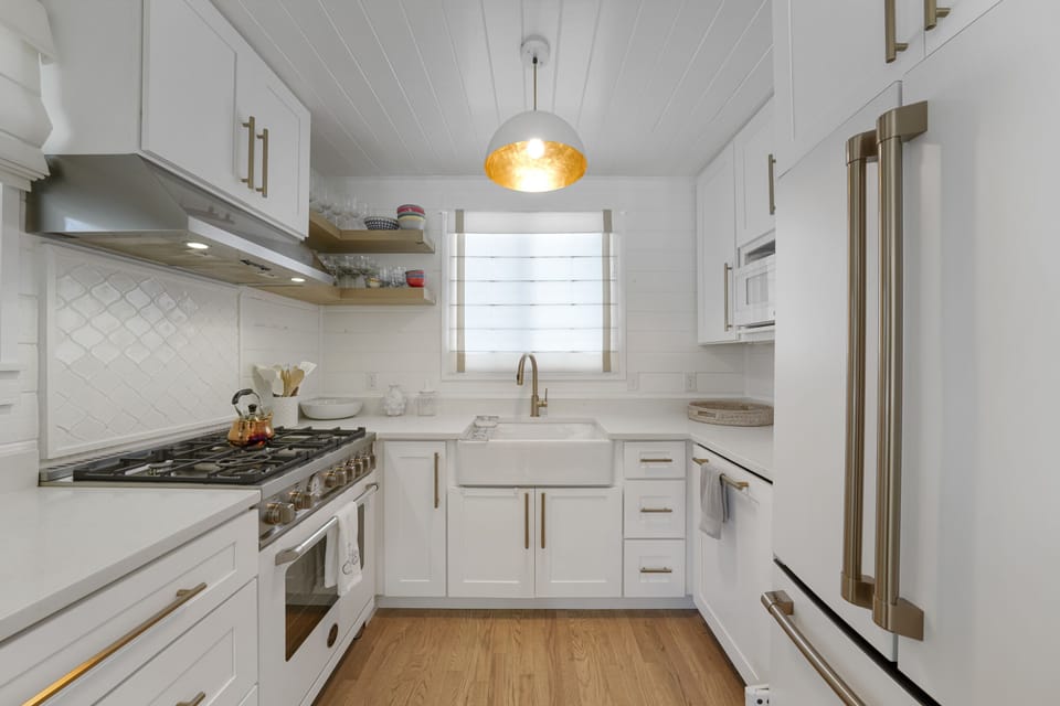COMPLETELY RENOVATED KITCHEN OFF OF LIVING