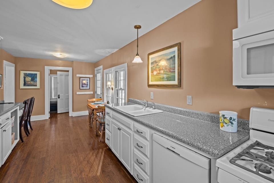 A historic kitchen graced with beautiful hardwood floors.
