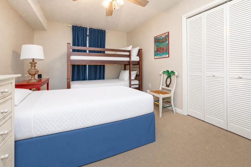 The guest suite offers a twin bed and twin bunk beds for restful nights after a day by the shore