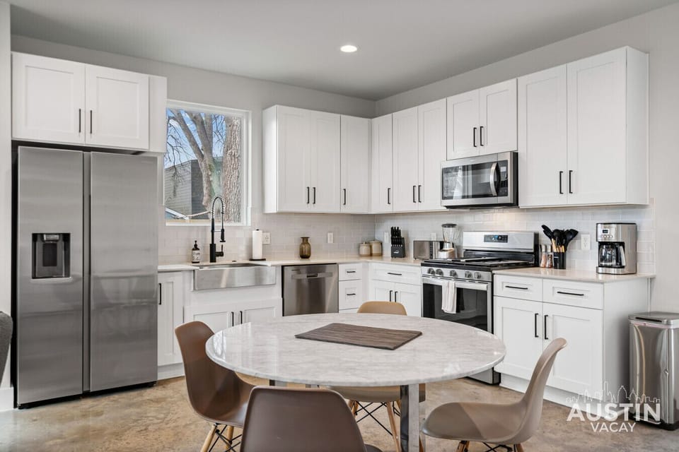 From gourmet prep to stylish dining in one bright, open space.