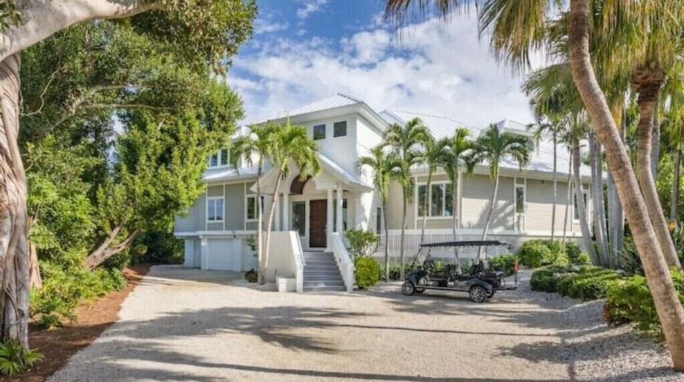 The front entrance and the 6 person golf cart (which is now white)