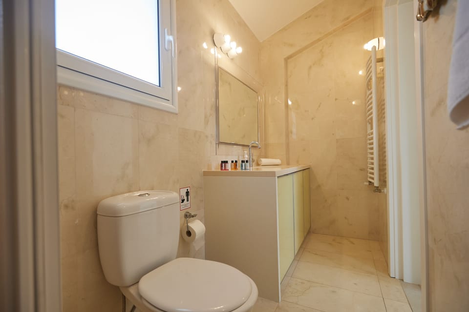 En suite Bathroom with Shower and WC