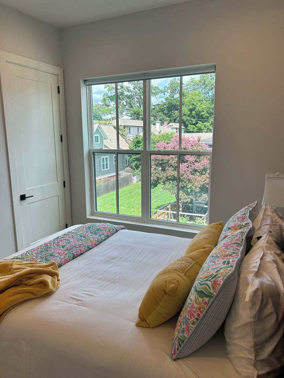 Bright and inviting guest bedroom with private bathroom attached. 
