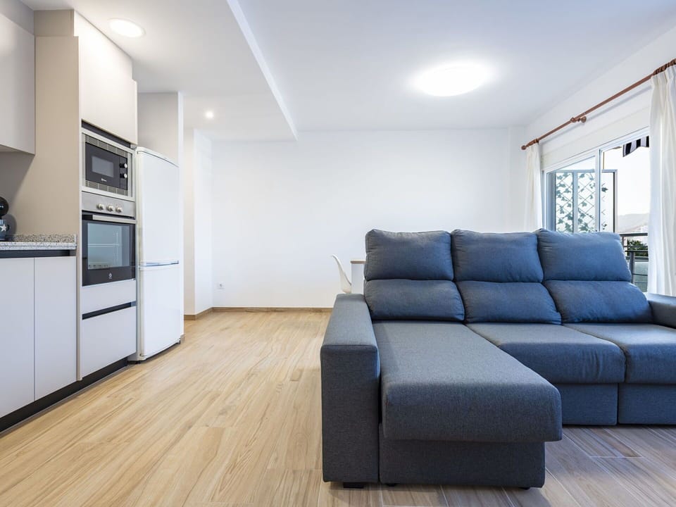 Property, Cabinetry, Interior Design, Wood, Comfort, Couch, Flooring, Living Room, Wall, Floor