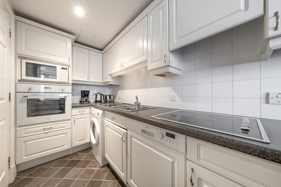 The kitchen is fully equipped to prepare a simple meal