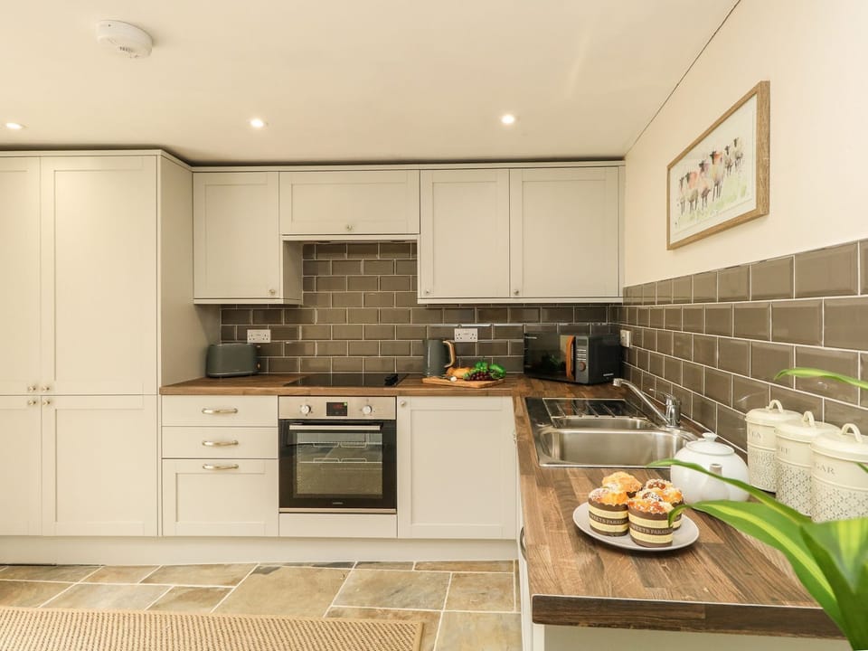 Fridge, dishwasher, electric kettle, cookware/dishes/utensils