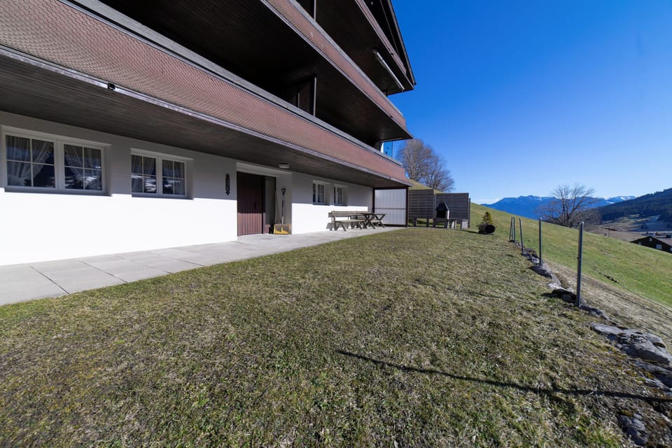 Outdoor seating with garden by the holiday home and mountain view