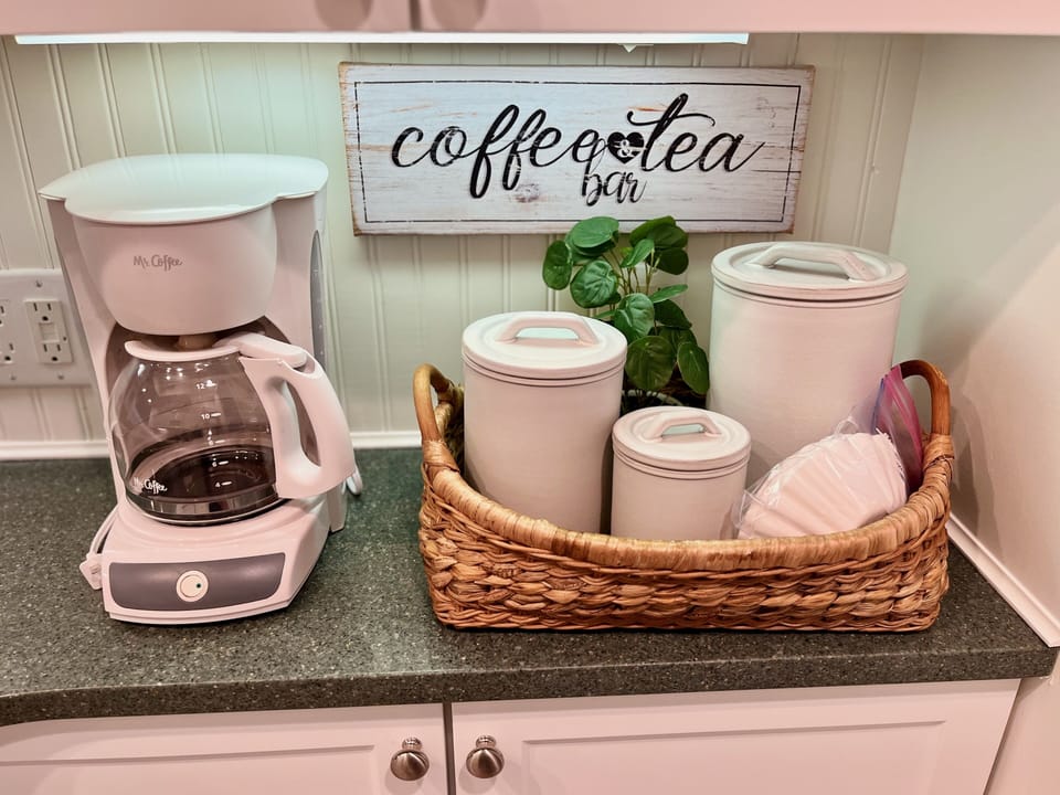 Coffee and tea station stocked for your enjoyment! 