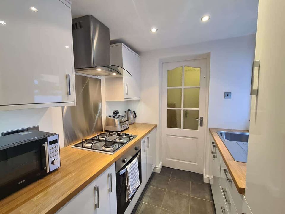 The Kitchen: the modern galley style kitchen is a great space to create some culinary masterpieces.