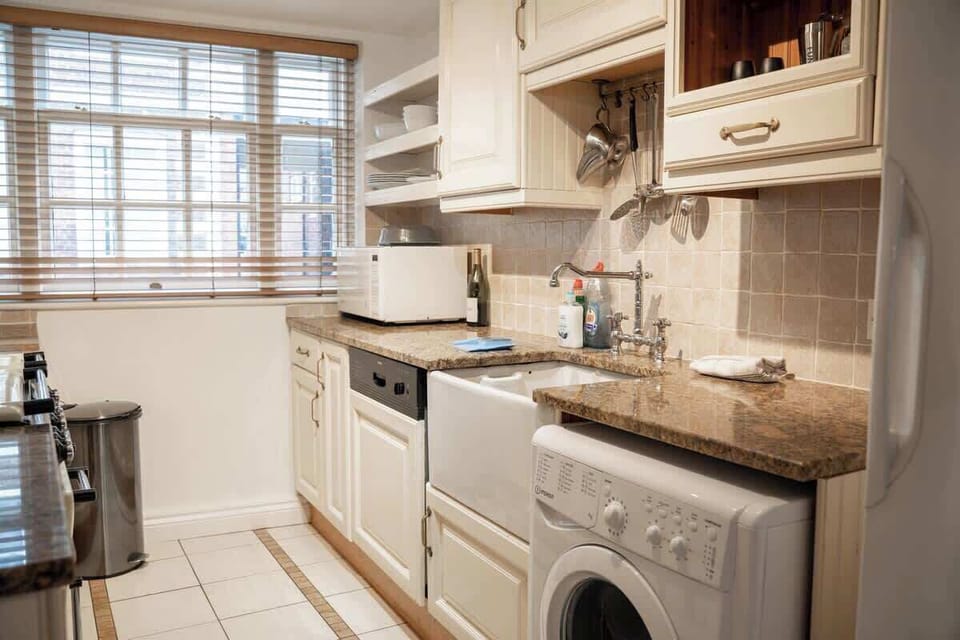 The Kitchen:  cook up a storm in our original cream country shaker style kitchen with granite worktops.