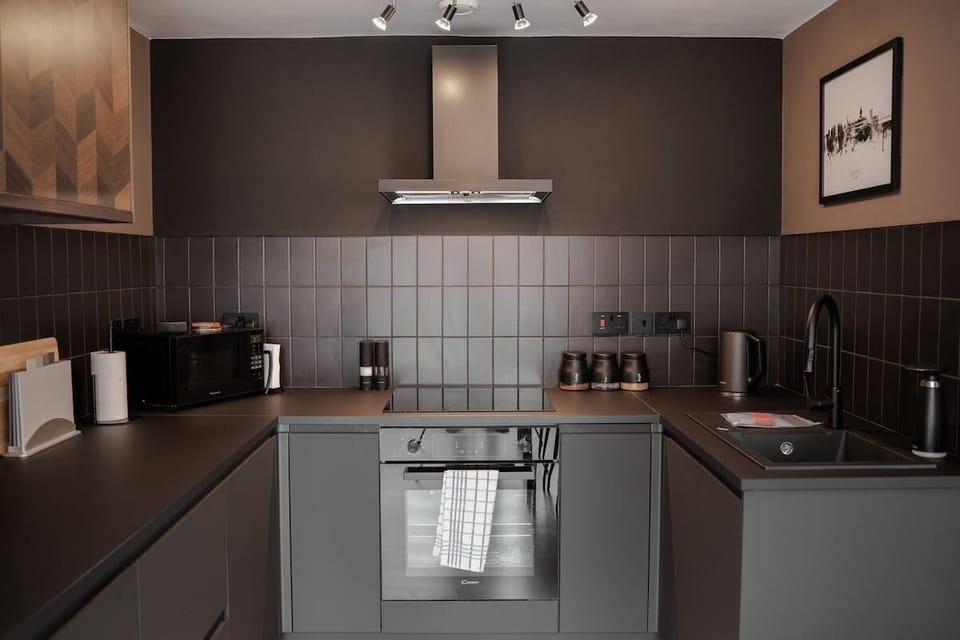 The Kitchen: whip up your favourite meals in the beautifully presented kitchen, equipped with modern amenities and ample storage.