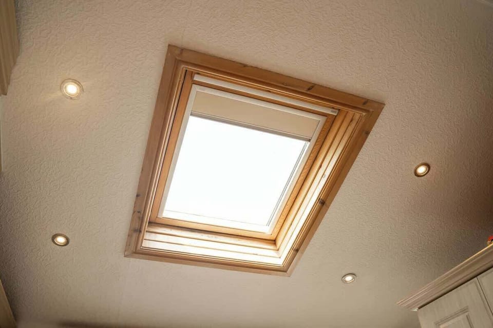 Bedroom 1: natural light floods in through the lodges'  Velux windows.