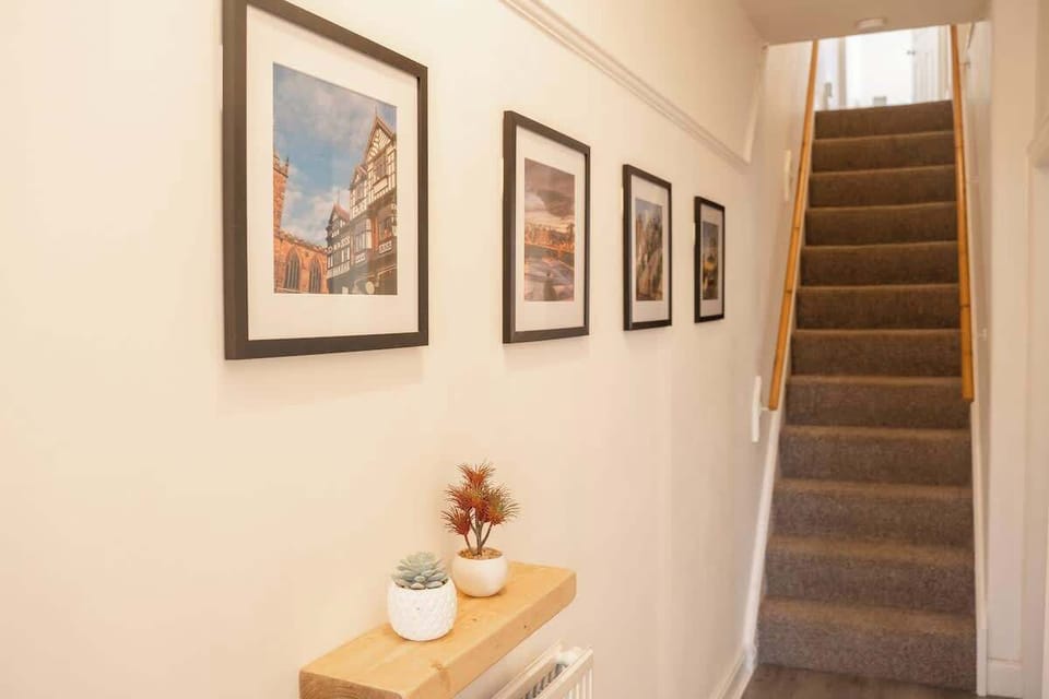 This spacious bedroom has storage for all your belongings, bay window and fireplace with comfy double bed