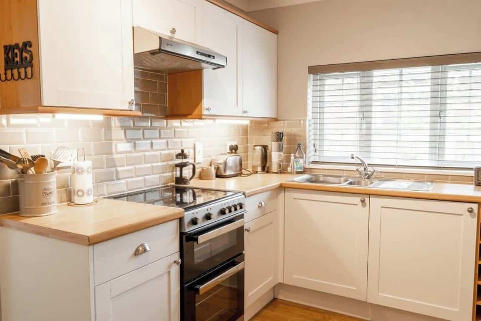 The Kitchen: the fully fitted kitchen is perfect for preparing delicious meals with modern conveniences.