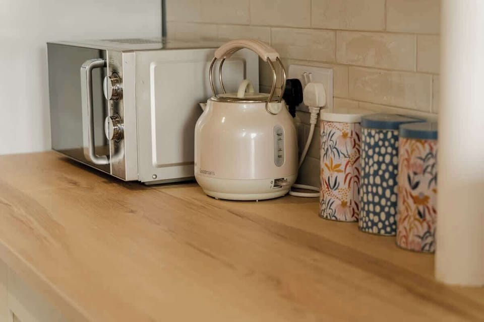 The Kitchen: the newly fitted kitchen is light & bright and a great space for cooking or making hot drinks.