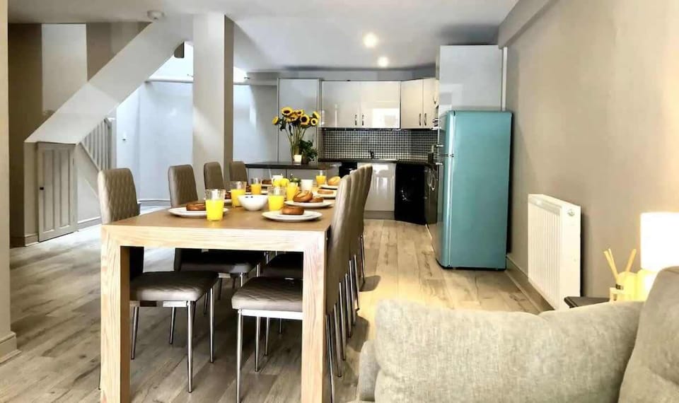 Home 1 - The Open Plan Living Space: with its modern and light décor, come together as a group to spend time together.