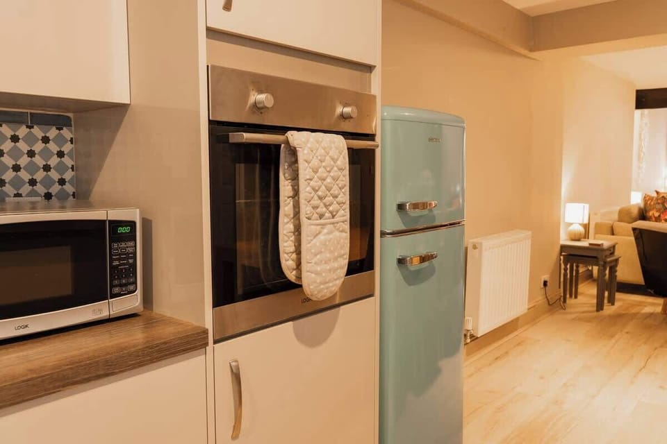 Home 1 - The Kitchen: socialise whilst cooking in this open plan space designed with entertaining in mind.
