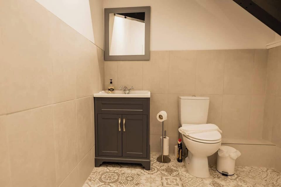 Home 1 - Bathroom 2: the property has 2 bathrooms both with showers for you to freshen up in.