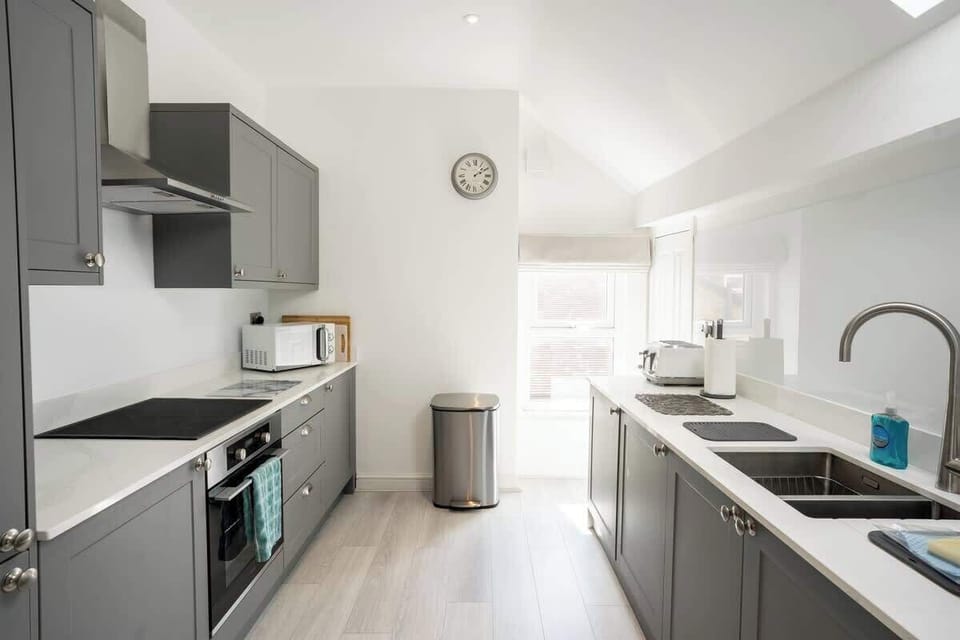 Kitchen: whip up your favourite family meals in the beautifully presented kitchen, equipped with modern amenities and ample storage space.