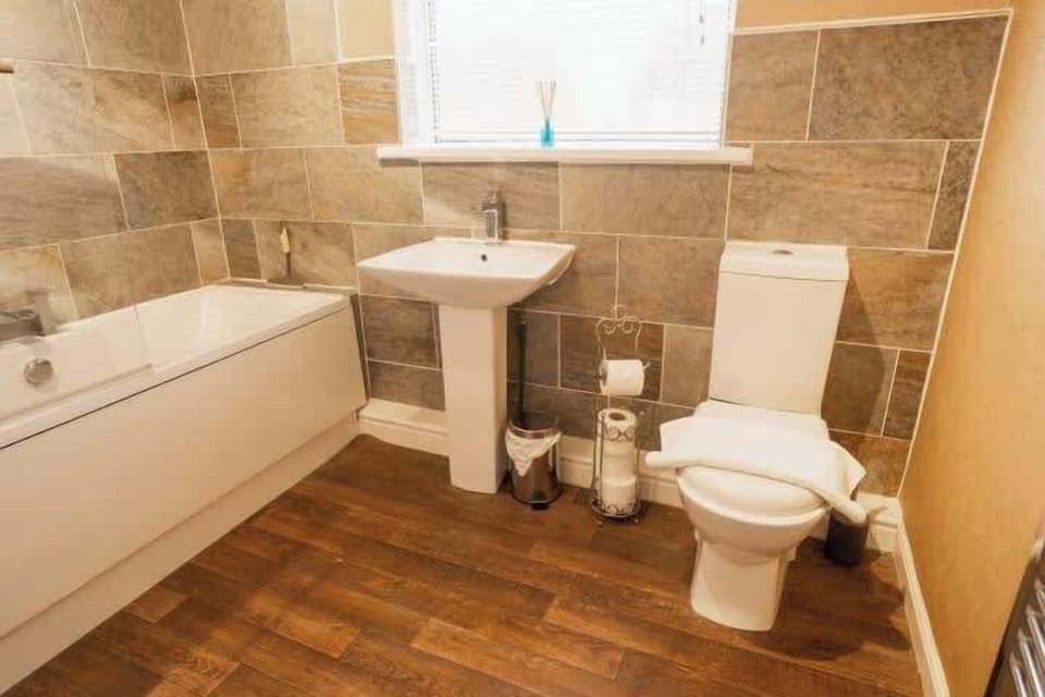 The Bathroom: the good sized bathroom has all amenities you need for a relaxing visit.
