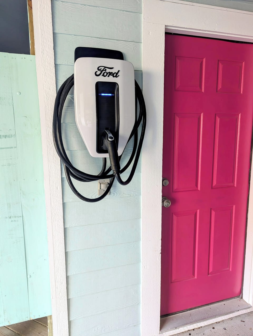 Complimentary  Level 2 EV Charger, J1772/CCS, 50 amp  inside  private carport