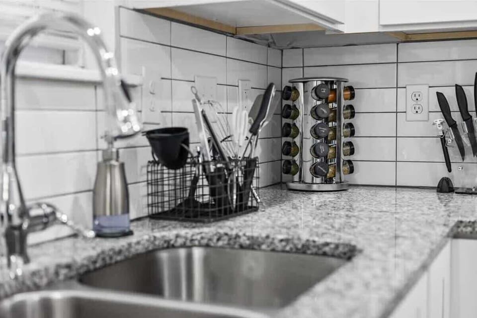 A dramatic zoom-in on cooking utensils, so that you know we're sophisticated. Also subtly implying we offer a unique short term rental experience.