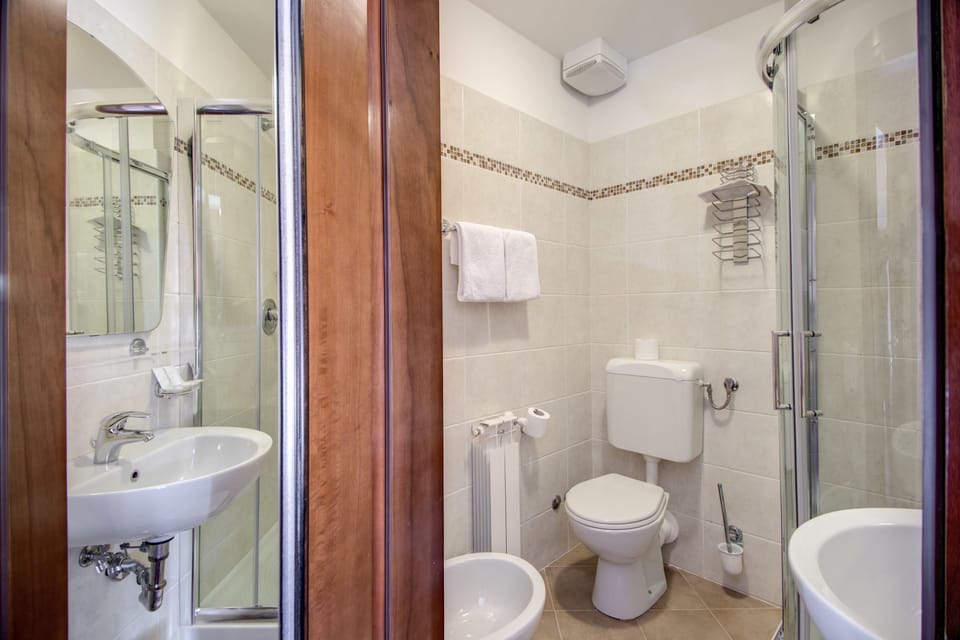Shower, free toiletries, hair dryer, towels