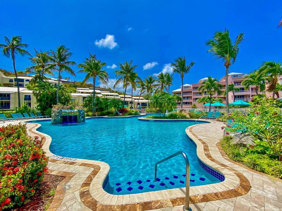 The Elysian pool and hot tub, right on the beach - free for you to use!